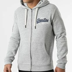 Sortie 🛒 Sweat Zippé Capuche Vintage Logo Classic M2011855A Gris Chiné de Superdry 🎁